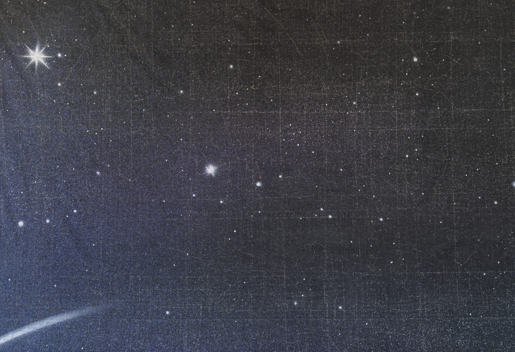 An image of a dark night sky filled with numerous stars, varying in brightness.